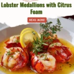 Médaillons de homard pochés avec air d’agrumes