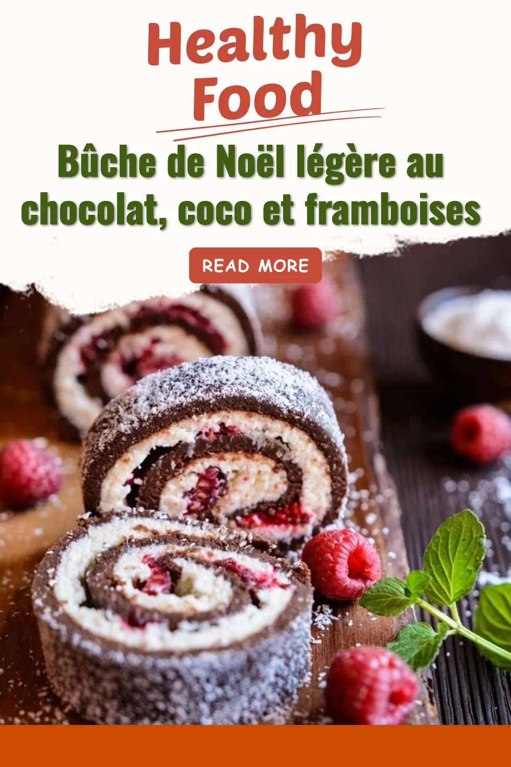 Bûche de Noël légère au chocolat, coco et framboises décorée pour les fêtes.